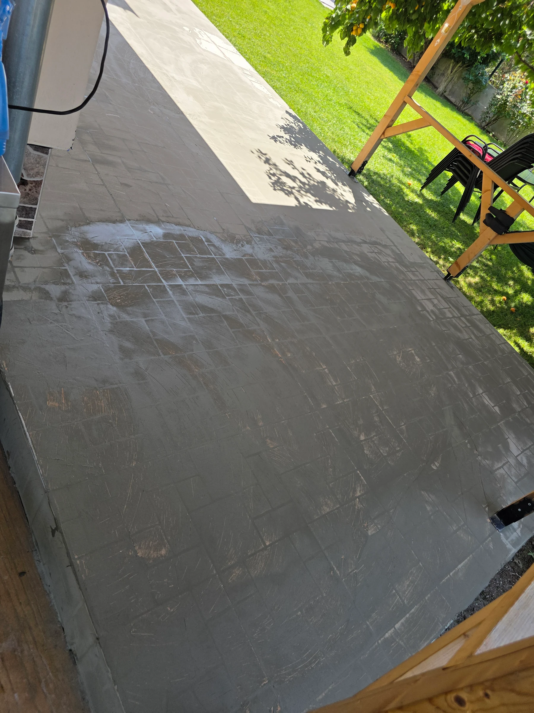 Earlier stage of floor preparation before the final surface finish.