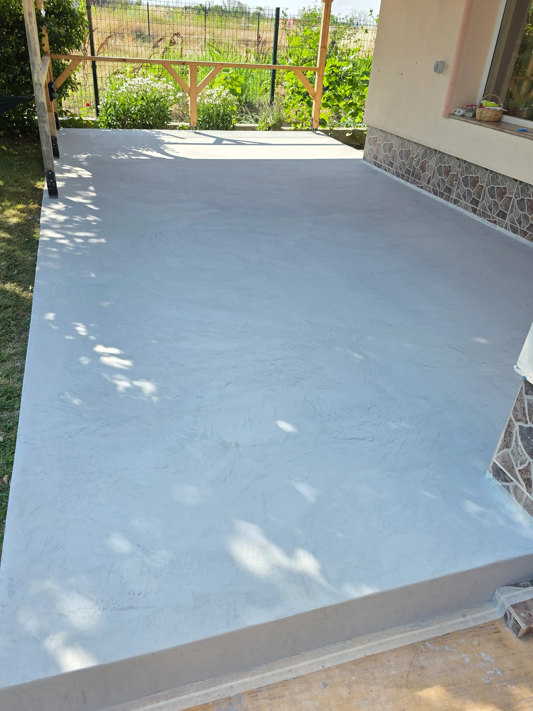 Close view of the even floor finish showing subtle hand-applied texture.