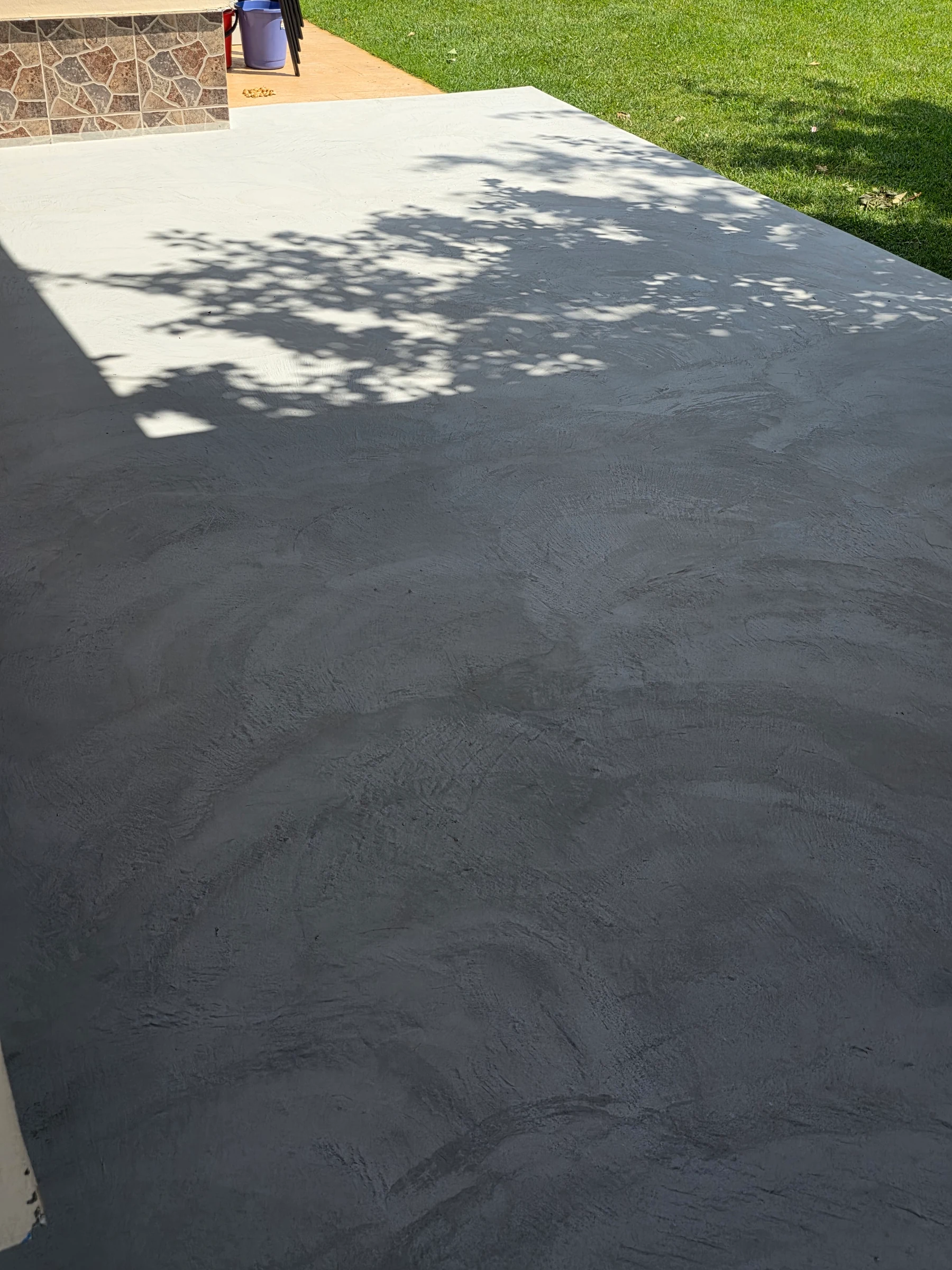 Application stage with visible trowel marks across the surface.